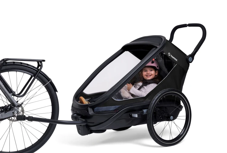 przyczepka rowerowa Hamax Outback Next dla dzieci z funkcją wózka spacerowego i amortyzacją